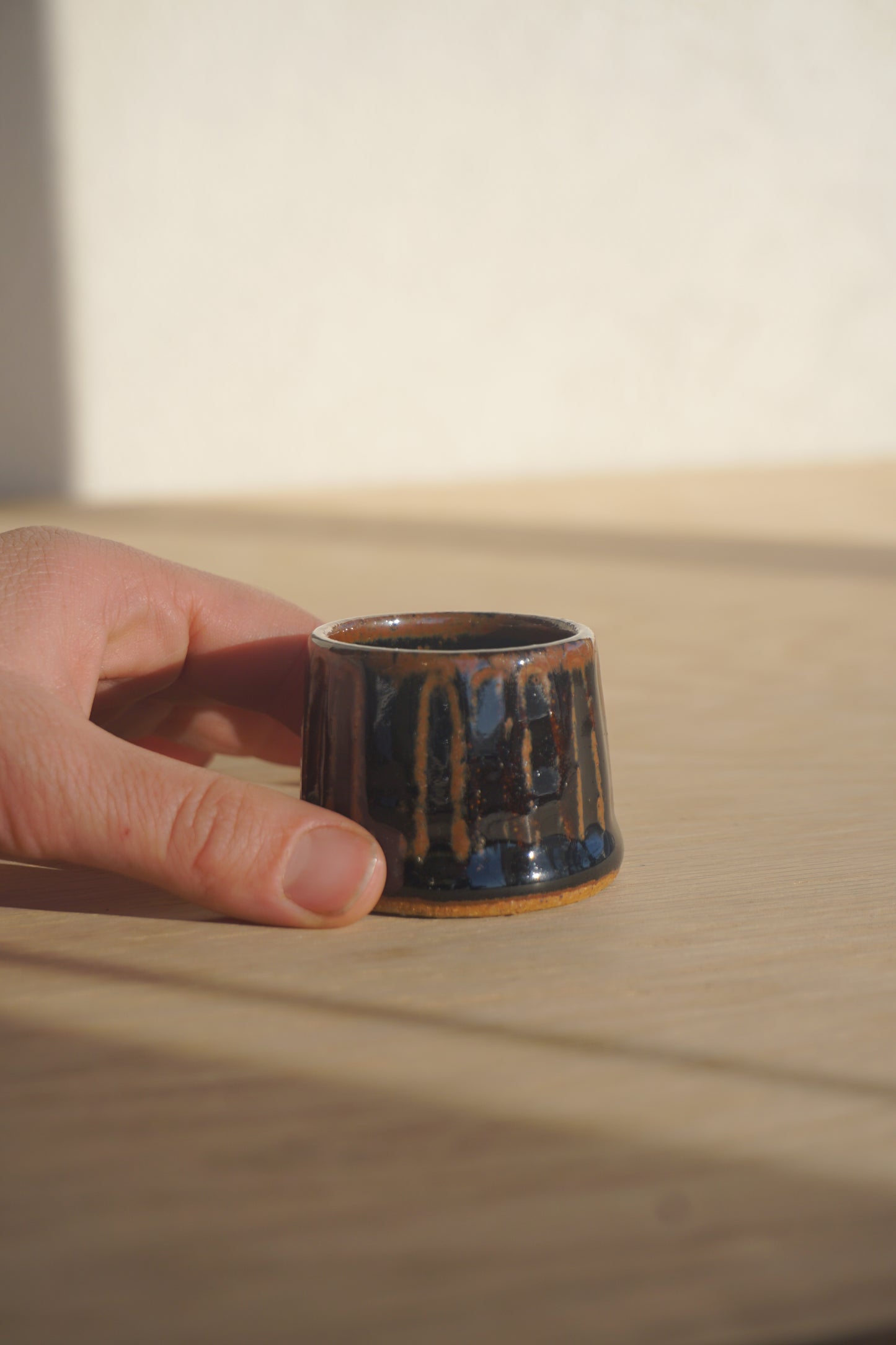 Candlestick set with match holder in dark brown
