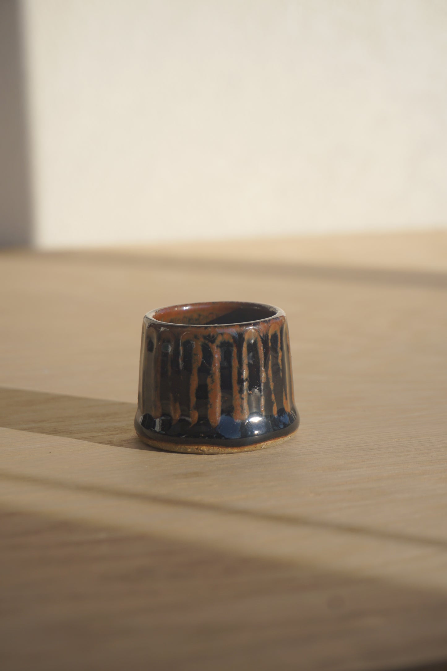 Candlestick set with match holder in dark brown