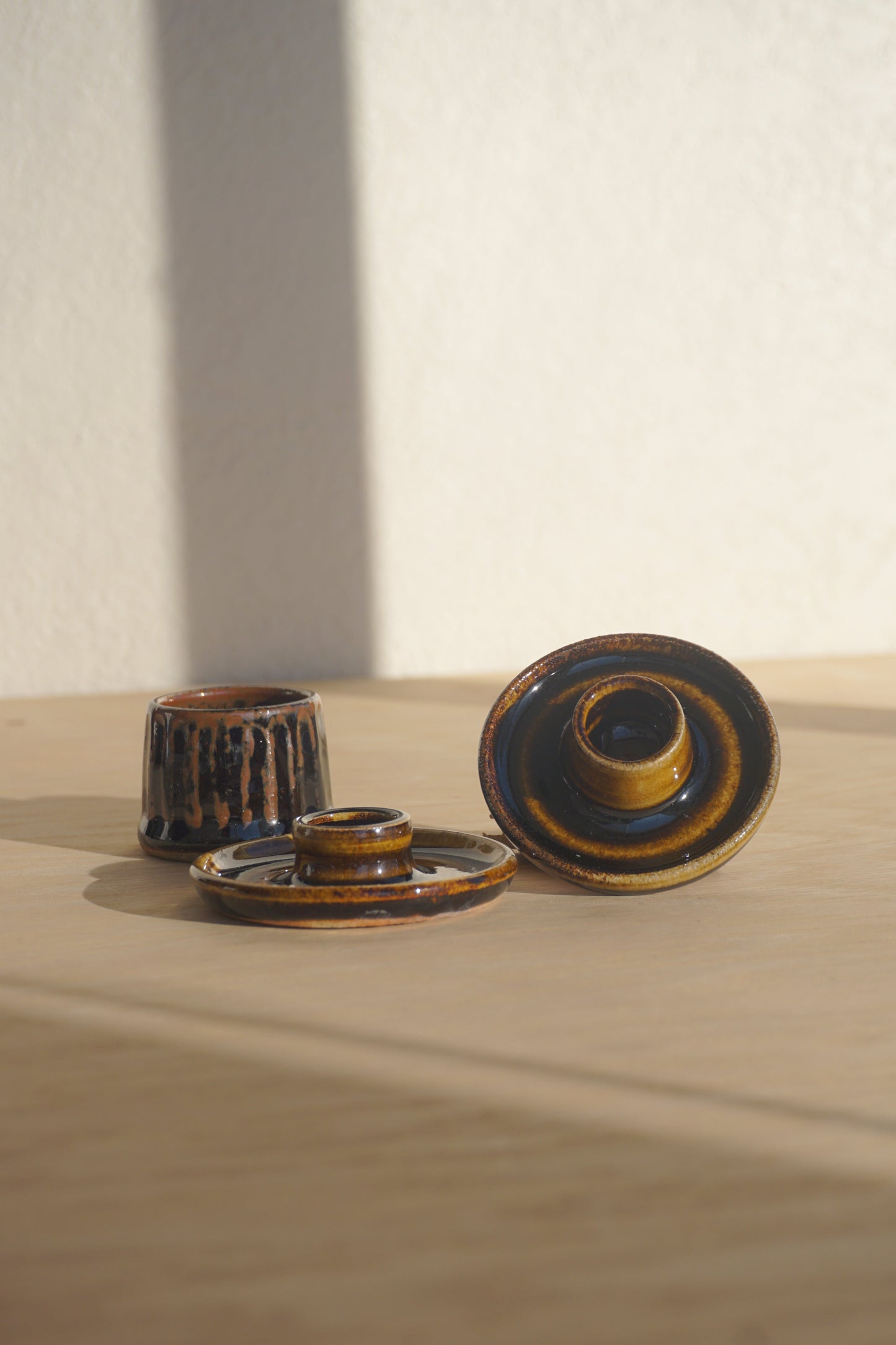 Candlestick set with match holder in dark brown