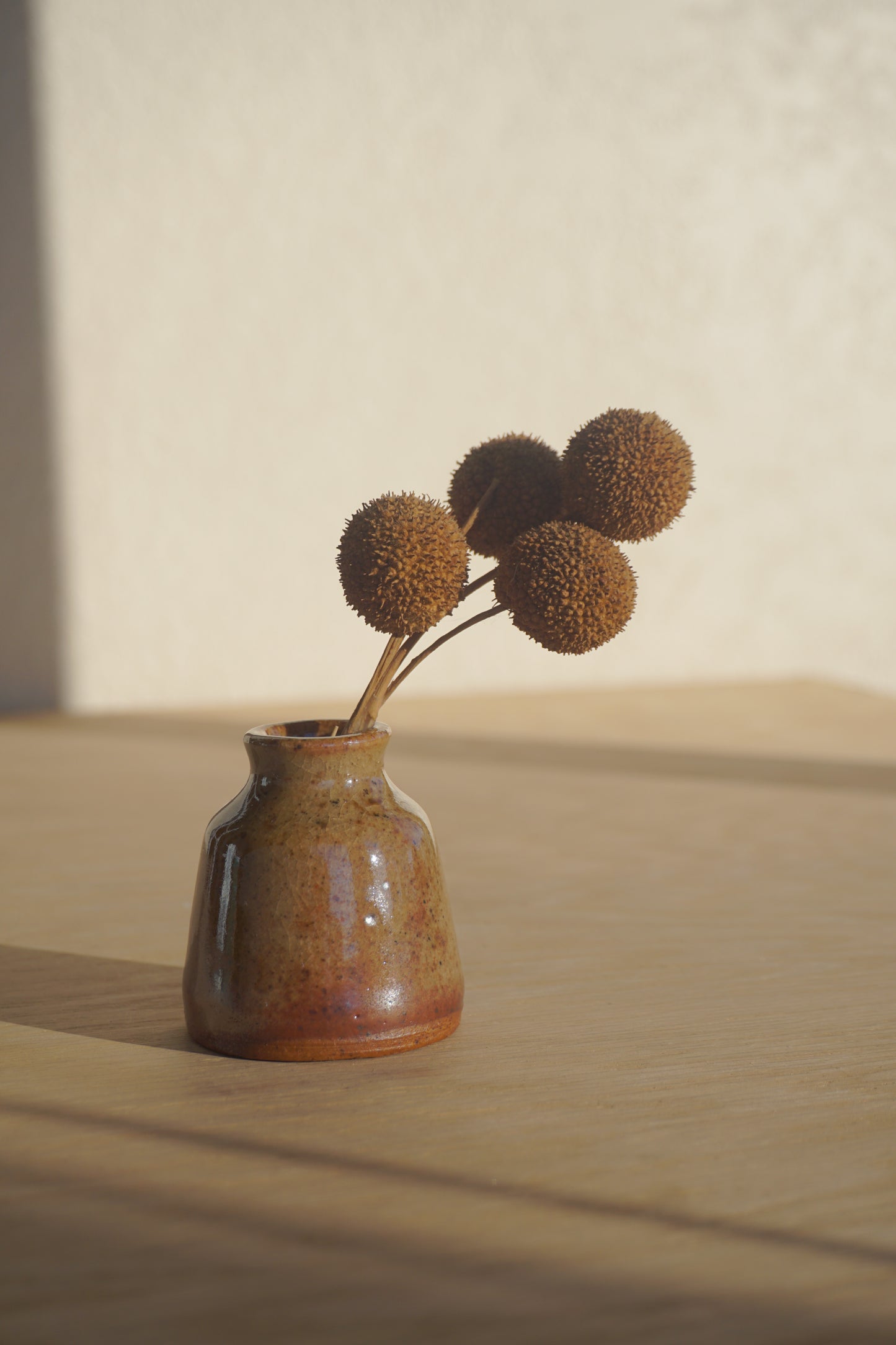 Small bud vase in gold shino