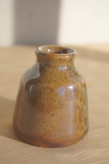 Small bud vase in gold shino
